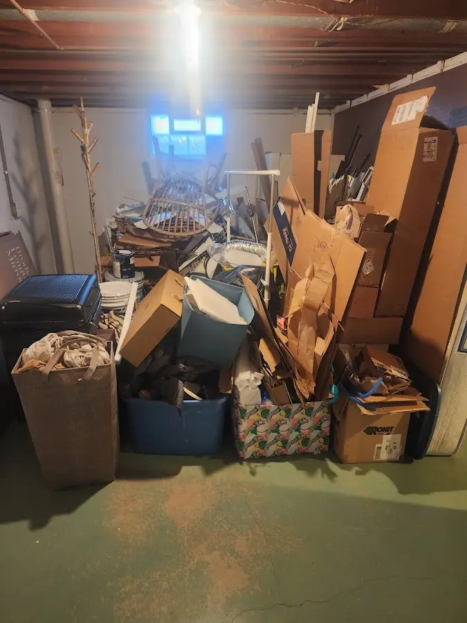 Roll-off dumpster container at job site for 2 Yard Dumpster Rental in Lake Clarke Shores